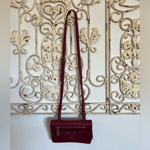 Dark red leather Perlina crossbody purse.  Excellent condition, only used once